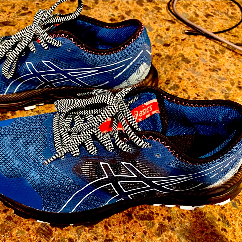 Women’s Asic’s tennis shoes.